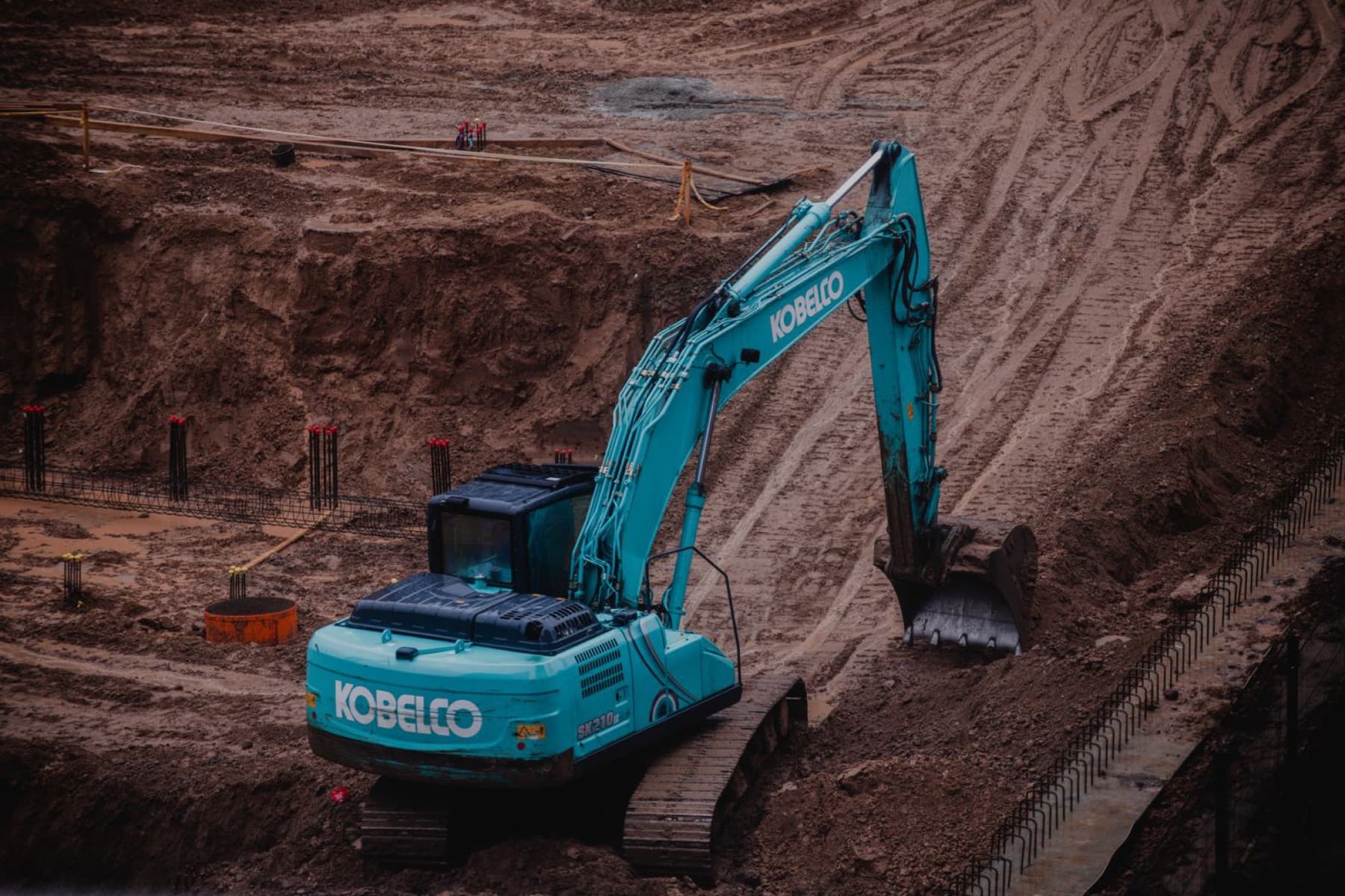 Underground-utilities and sitework. The asset-heavy, cash-generative construction the machine now acquires.